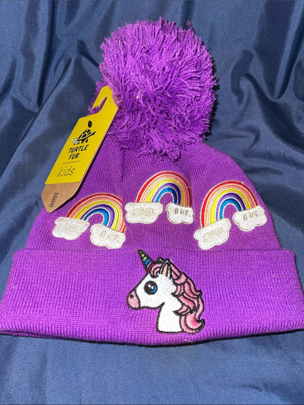 Turtle Fur Kids Purple Unicorn & Rainbow Pom Pom Stocking Cap